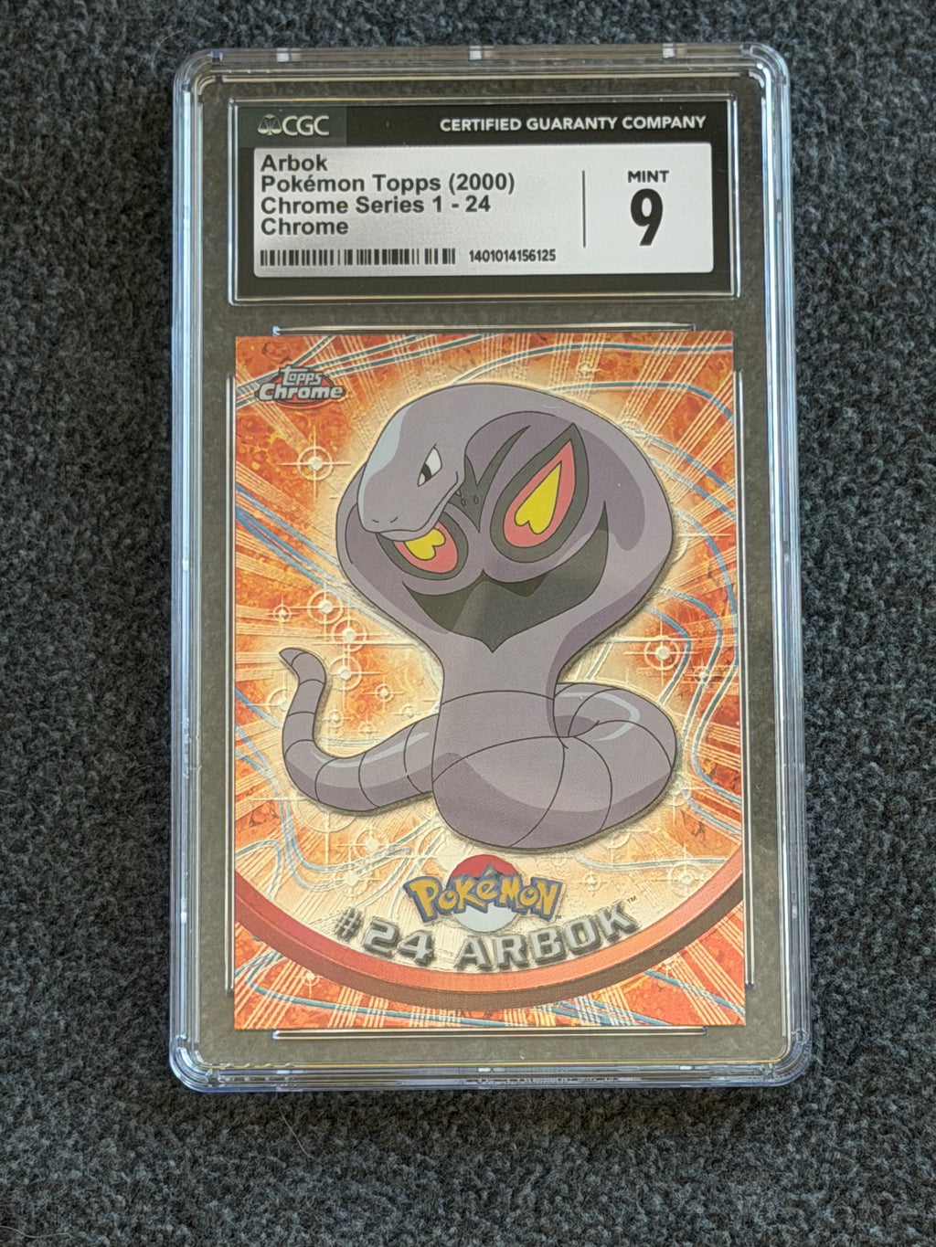 Arbok (Chrome) — Topps Series 1 #24 (front)